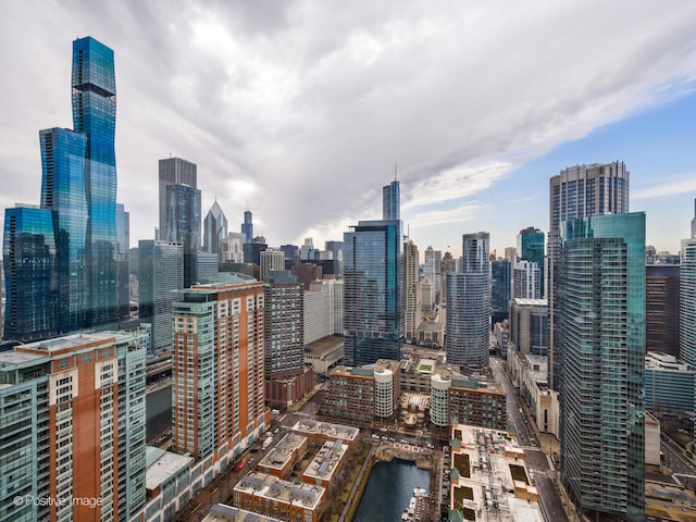 property's view of city with a water view