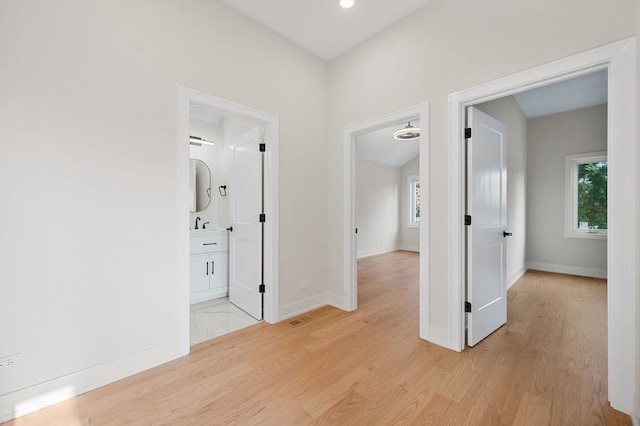 hall featuring light wood-type flooring