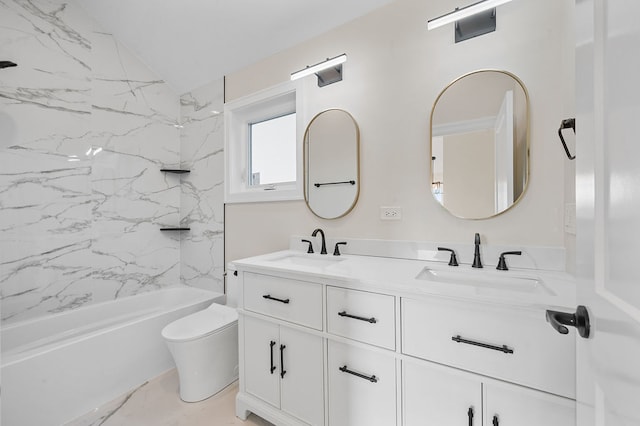 full bathroom featuring vanity, toilet, tiled shower / bath, and vaulted ceiling