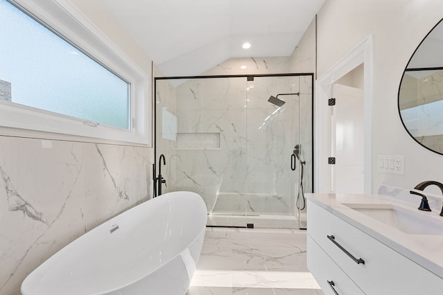 bathroom featuring vanity, separate shower and tub, and lofted ceiling