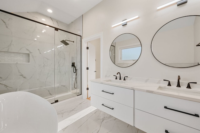 bathroom with vanity and separate shower and tub