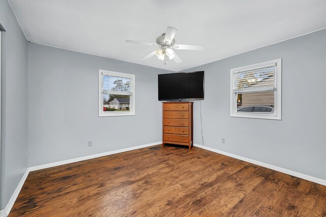 unfurnished room featuring wood-type flooring and ceiling fan