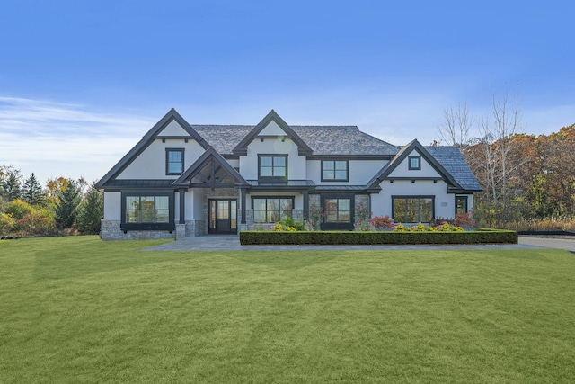 view of front of home featuring a front lawn