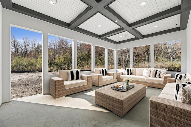 sunroom featuring beamed ceiling and coffered ceiling