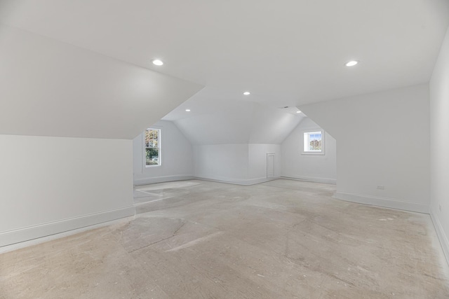 bonus room featuring lofted ceiling