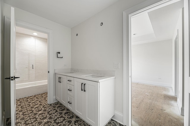 bathroom featuring vanity and walk in shower