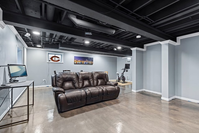 living room with concrete flooring