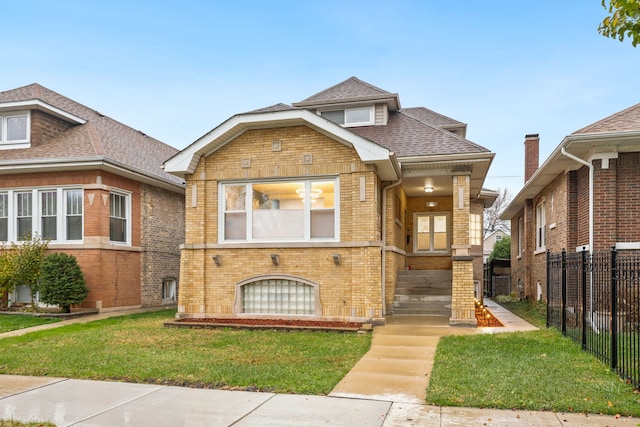 view of front facade with a front lawn