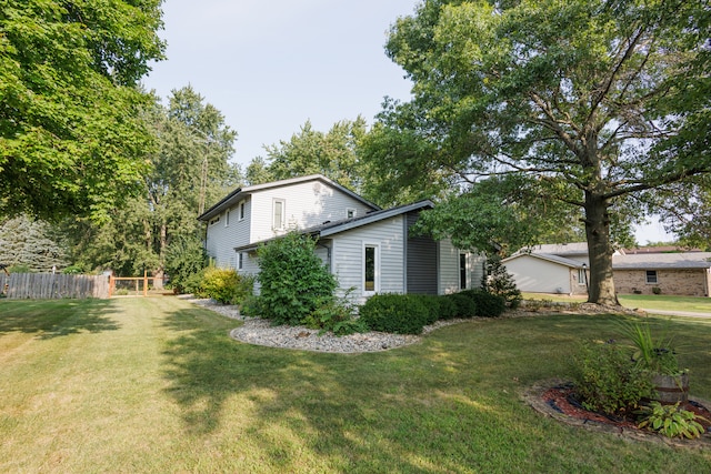 exterior space with a lawn