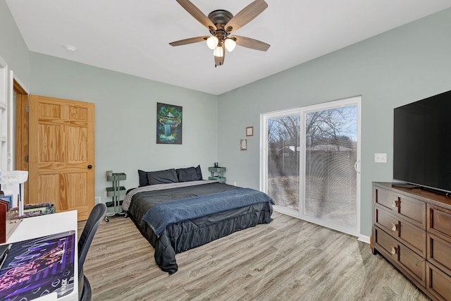 bedroom featuring access to exterior, light wood-type flooring, baseboards, and a ceiling fan