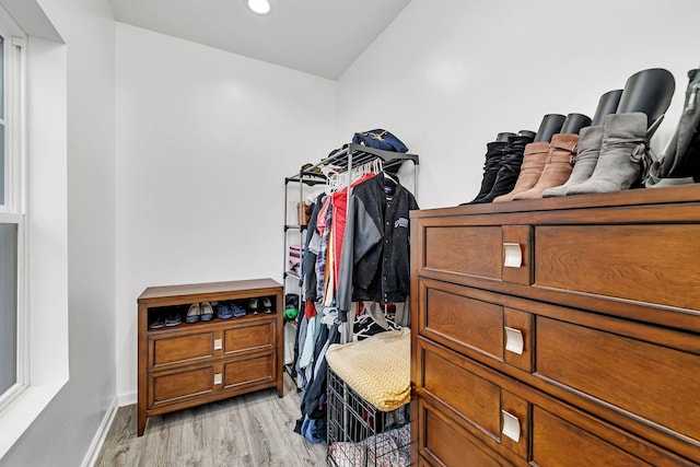 spacious closet with light wood-style flooring