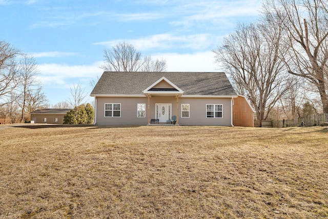 single story home with a front lawn and roof with shingles