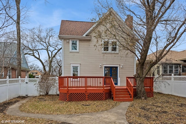 rear view of house with a deck