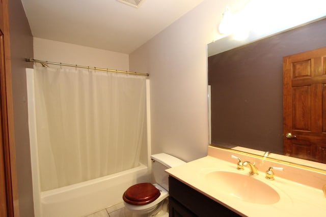 full bathroom with tile patterned flooring, vanity, shower / tub combo, and toilet