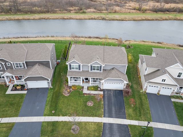 drone / aerial view featuring a water view