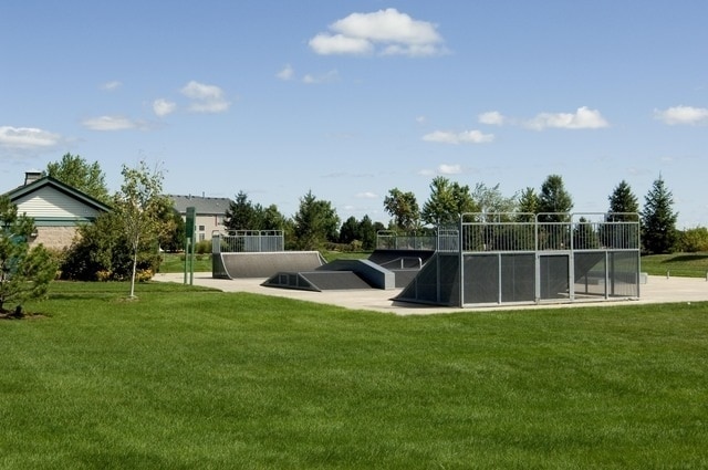 view of home's community with a lawn