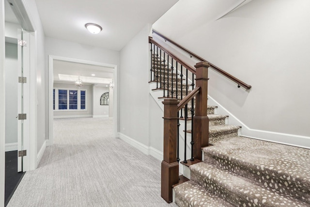 stairway with carpet floors