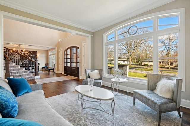 interior space featuring a chandelier and french doors