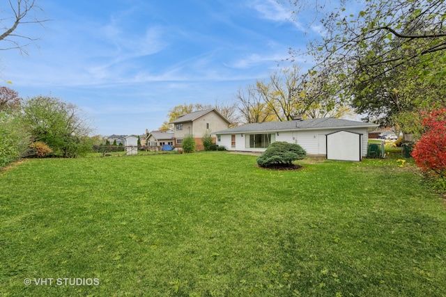 back of house with a lawn