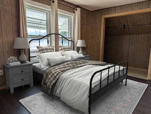 bedroom featuring wood walls, dark hardwood / wood-style flooring, and vaulted ceiling