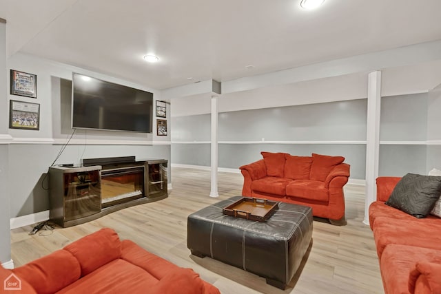 living room with light hardwood / wood-style flooring