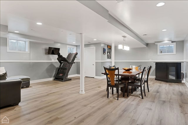 dining space with light wood-type flooring