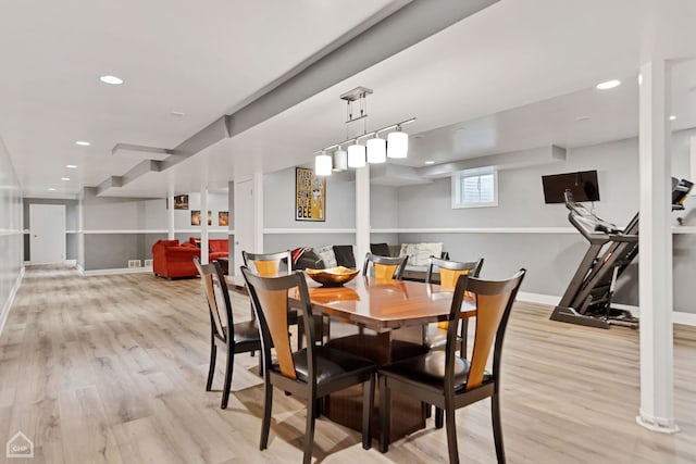 dining space featuring light hardwood / wood-style floors