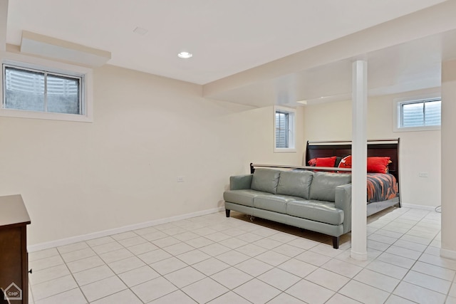 bedroom with light tile patterned floors