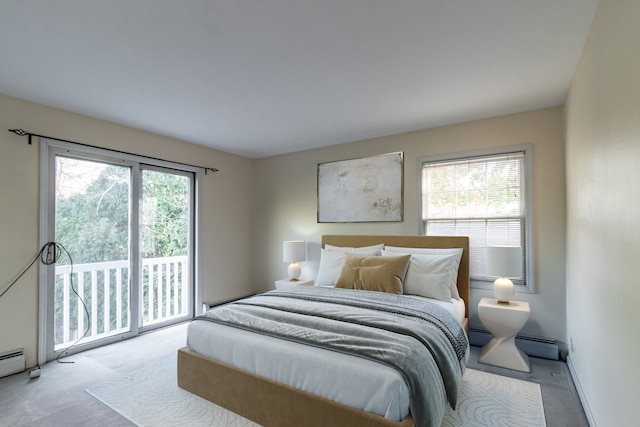 bedroom featuring light carpet, access to outside, and a baseboard radiator