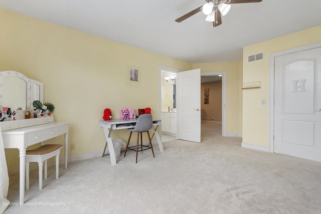 dining area with visible vents, a ceiling fan, baseboards, and light carpet
