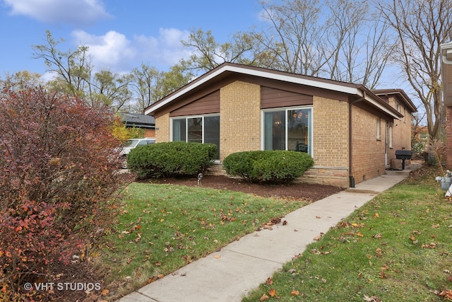 view of property exterior featuring a yard