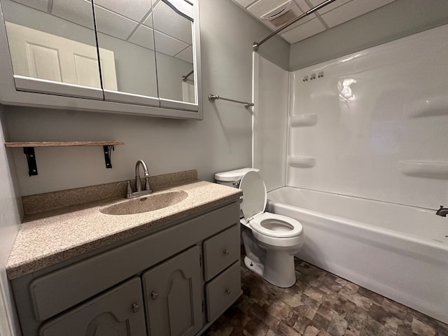 full bathroom featuring vanity,  shower combination, and toilet