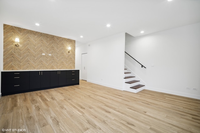 unfurnished living room with light wood-type flooring