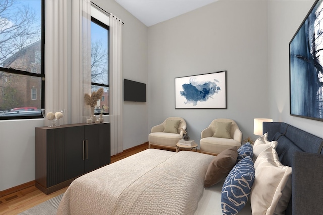 bedroom with wood-type flooring