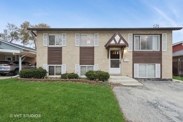 12416 S Trumbull Ave, Alsip, IL 60803 - view of front of house featuring a front yard and brick siding