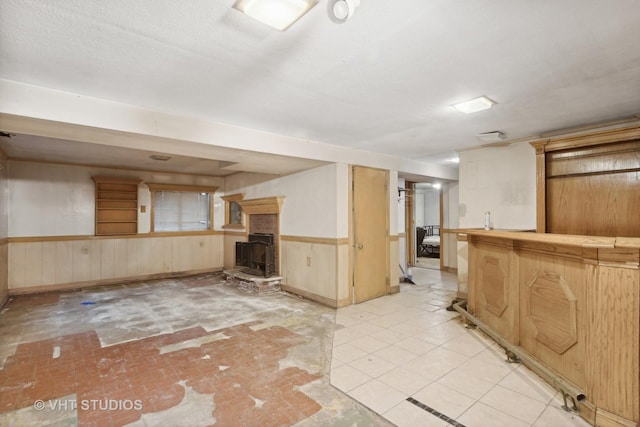 12416 S Trumbull Ave, Alsip, IL 60803 - indoor bar featuring wainscoting, wood walls, and a fireplace with raised hearth