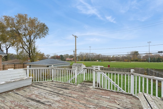 deck featuring a lawn