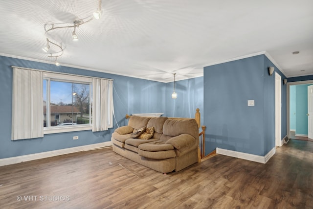 living room with hardwood / wood-style floors and ornamental molding