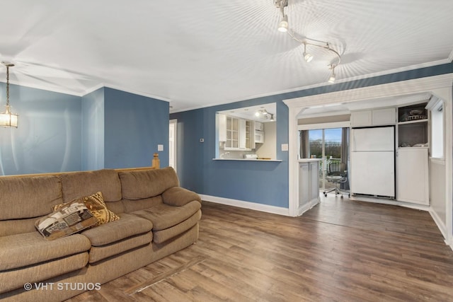 12416 S Trumbull Ave, Alsip, IL 60803 - living room with baseboards, crown molding, and wood finished floors