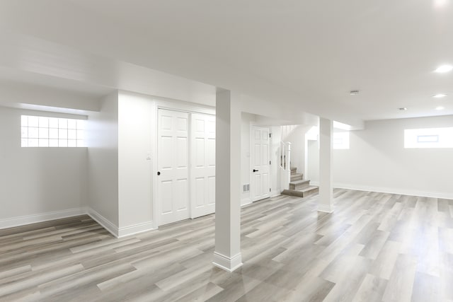 basement with light wood-type flooring