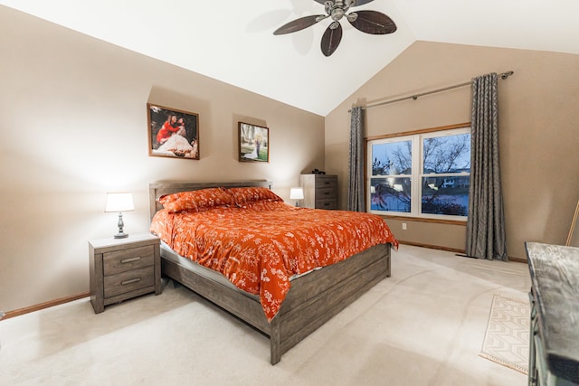 bedroom with light carpet, vaulted ceiling, and ceiling fan