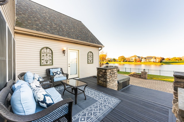 deck featuring a water view