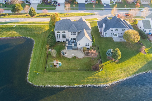 drone / aerial view with a water view