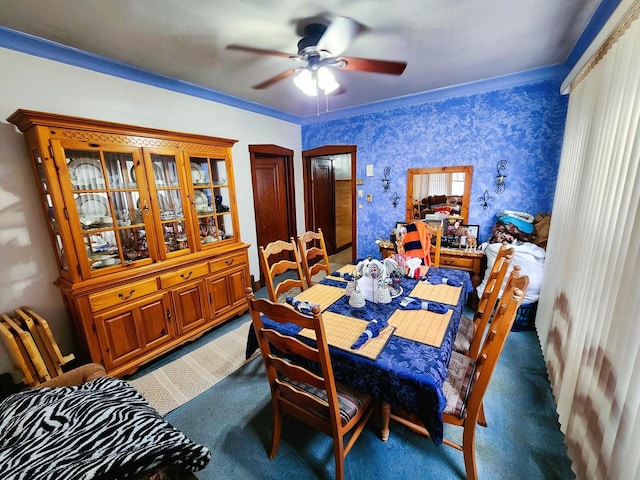 dining room featuring ceiling fan and crown molding