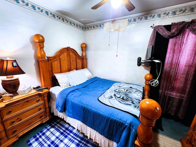 bedroom with carpet, ceiling fan, and crown molding