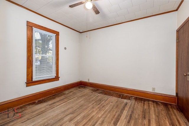 unfurnished room featuring ceiling fan, crown molding, and hardwood / wood-style flooring