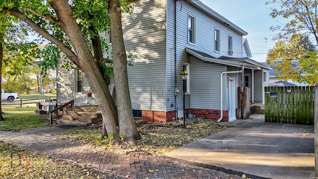 view of home's exterior with central air condition unit