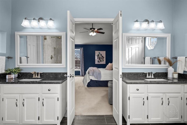 bathroom featuring vanity and ceiling fan