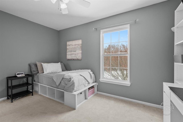 bedroom featuring ceiling fan and light colored carpet