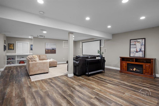 living room with dark hardwood / wood-style floors